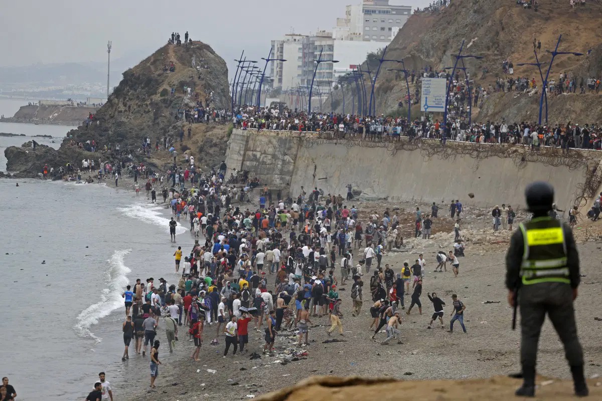 Thousands cross from Morocco into Spain in new migrant crisis